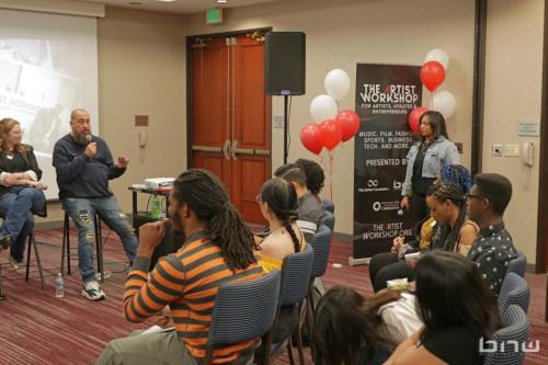 Panelist Jon Stockton speaks alongside Harriet Duncan to workshop members at The Artist Workshop: Career Day.