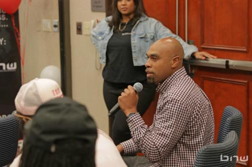 Workshop attendee and filmmaker Robert Walker introducing himself and asking the panelists a question at The Artist Workshop: Career Day.