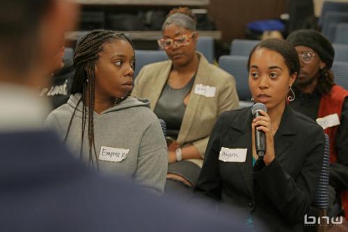 Workshop member Ayana asks the group of panelists a question about her personal music career at The Artist Workshop: Career Day.