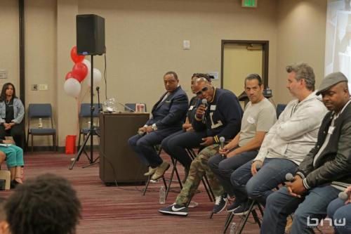 Panelist Shyan Selah speaks alongside his fellow co-panelists Curtis Elerson, A'Noelle Jackson, John Silva, Charles Newman and Kirkland Morris at The Artist Workshop: Career Day