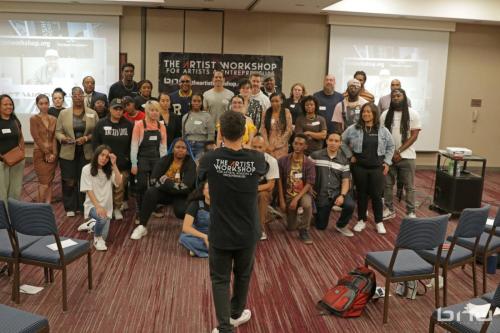 Workshop member and panelists all pose together with Video Director Larry Dominico taking a quick video at The Artist Workshop: Career Day