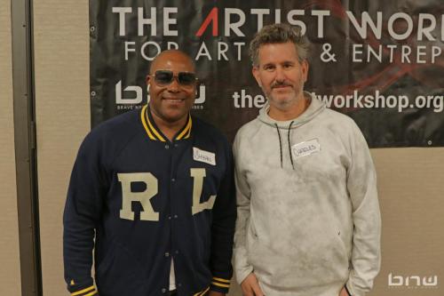 Panelists Shyan Selah and Charles Newman pose together at The Artist Workshop: Career Day