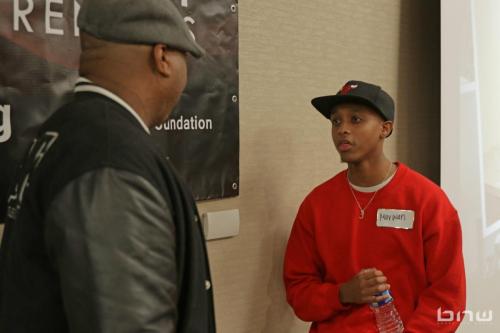 Panelist Kirkland Morris speaks to worksop member Marwan about movie scripts at The Artist Workshop: Career Day