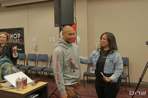 Event Producer Candice Richardson speaks to workshop member Rai at The Artist Workshop: Career Day