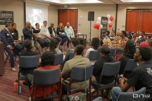 Panelist Shyan Selah speaks to the workshop members alongside Curtis Elerson, A'Noelle Jackson, John Silva, Charles Newman, Kirkland Morris, Harriet Duncan and Jon Stockton at The Artist Workshop: Career Day