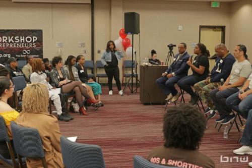 Panelist A'Noelle address the workshop members alongside her fellow panelists at The Artist Workshop: Career Day