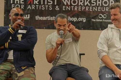 Panelist John Silva speaks to the audience next to Shyan Selah and Charles Newman at The Artist Workshop: Career Day