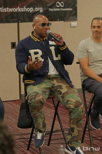 Panelist Shyan Selah answers the group member's question next to John Silva and A'Noelle Jackson at The Artist Workshop: Career Day