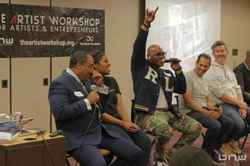 Panelist Shyan Selah laughs with the crowd next to Curtis Elerson, A'Noelle Jackson, John Silva and Charles Newman at The Artist Workshop: Career Day