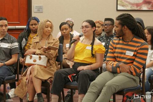 Workshop member Susana asks the panelists a question at The Artist Workshop: Career Day