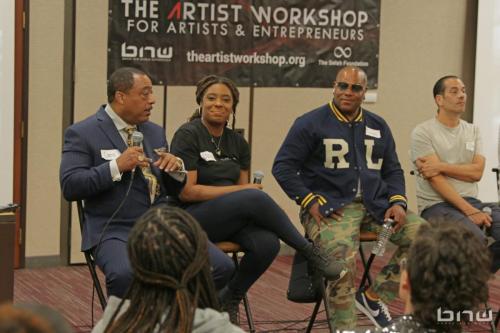 Panelist Curtis Elerson answers a question alongside A'Noelle Jackson, Shyan Selah and John Silva at The Artist Workshop: Career Day 