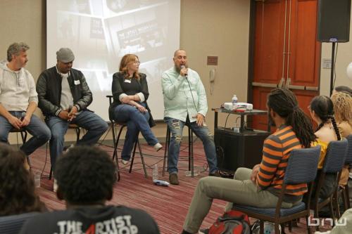 Panelist Jon Stockton answer a question next to Harriet Duncan, Kirkland Morris and Charles Newman at The Artist Workshop: Career Day 