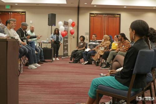 Workshop members listen in to panelist Kirkland Morris at The Artist Workshop: Career Day