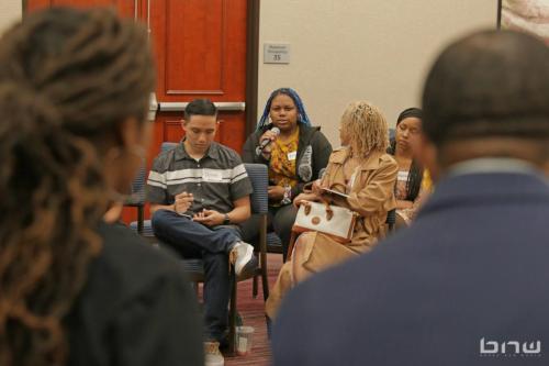 Workshop member Brea asks the panelists a question at The Artist Workshop: Career Day