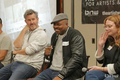Panelists Charles Newman, Kirkland Morris and Harriet Duncan chuckle together at The Artist Workshop: Career Day