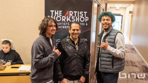 John Silva pose with attendees at the Artist Workshop: The Creative Process