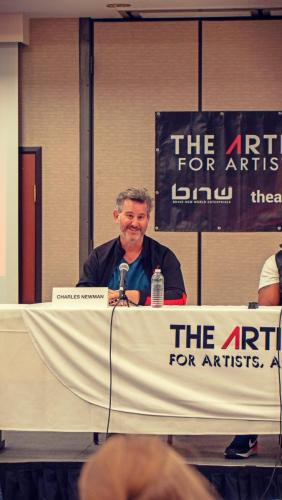 Panelist Charles Newman answering a question from the attendees at The Artist Workshop: The Long Money Game.