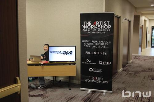 Promotions Director Asia Selah at the check-in area at The Artist Workshop: Production 101 