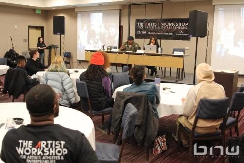 Attendees listen to panelists Shyan Selah and Candice Richardson at The Artist Workshop: Production 101