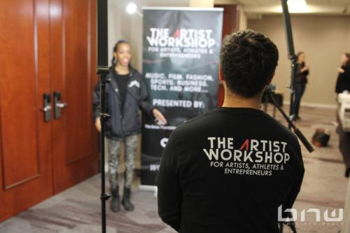 Larry Dominico interviews an attendee at The Artist Workshop: Production 101 