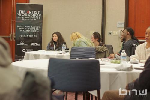 Promotions Director Asia Selah sits with attendees at The Artist Workshop: The Actor