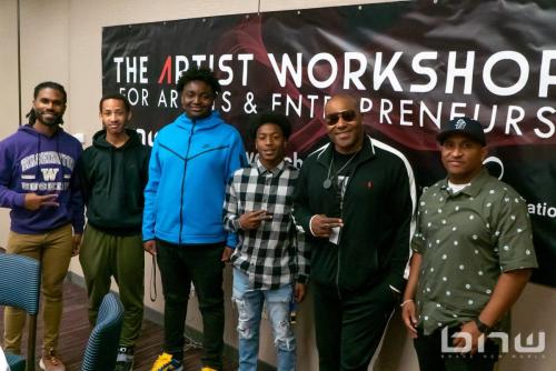 Shyan Selah poses with attendees at The Artist Workshop: Music and Entertainment 101