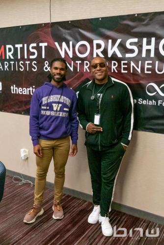 State representative and Community Outreach Director for Washington State Treasury, Jesse Johnson poses with the founder of the Artist Workshop, Brave New World, and the Shyan Selah Foundation, Shyan Selah at The Artist Workshop: Music and Entertainment 101